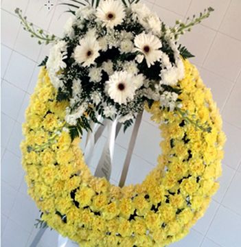 Tanesa Funeraria Y Tanatorio Extremeño S.A corona amarilla
